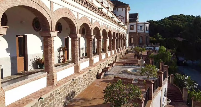 Casa Diocesana arcaded terrace